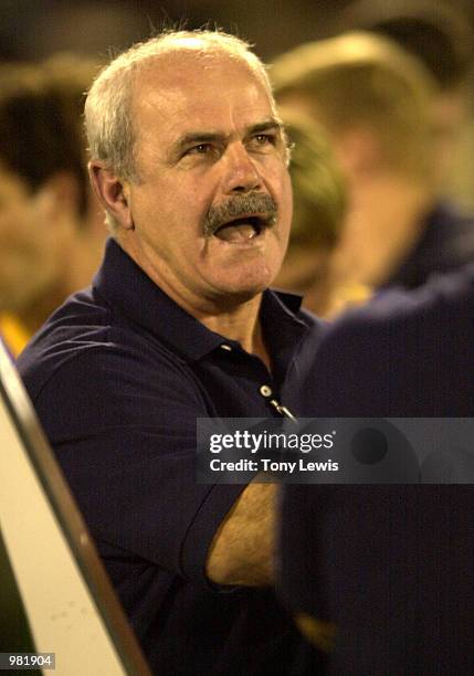 Brisbane coach Leigh Matthews addresses palyers at quarter time in the Ansett Cup Grand Final between the Brisbane Lions and Port Power played at...