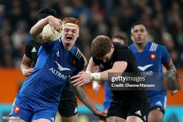 Felix Lambey of France is tackled by Jordie Barrett of the All Blacks during the International Test match between the New Zealand All Blacks and...