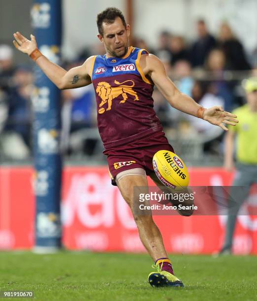 Luke Hodge of the Lions kicks the ball during the round 14 AFL match between the Brisbane Lions and the Greater Western Sydney Giants at The Gabba on...
