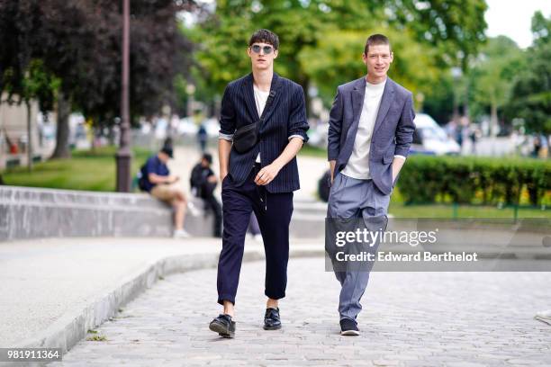 Guest wears a blazer jacket, outside Cerruti, during Paris Fashion Week - Menswear Spring-Summer 2019 on June 22, 2018 in Paris, France.