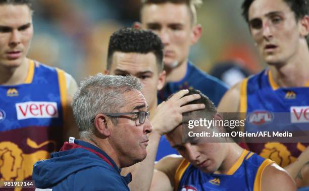 Lions coach Chris Fagan talks to his players during the round 14 AFL match between the Brisbane Lions and the Greater Western Sydney Giants at The...