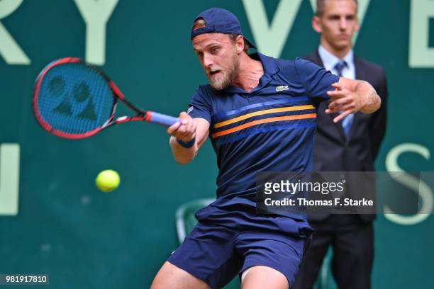 Denis Kudla of the United States plays a forehand in his half final match against Roger Federer of Switzerland during day six of the Gerry Weber Open...