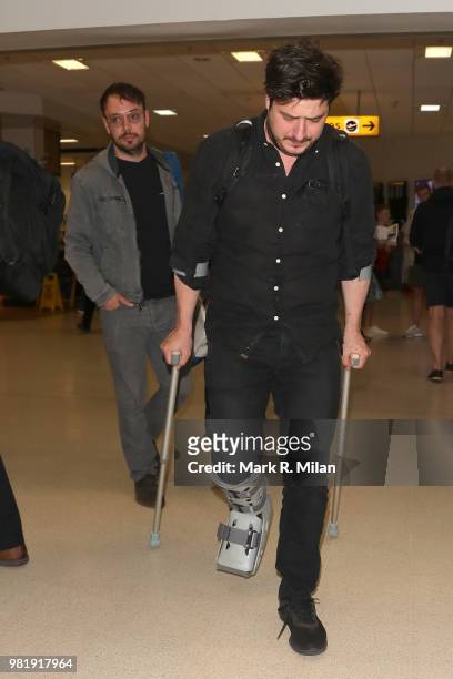 Marcus Mumford and Ben Lovett arriving at Aberdeen Airport before the wedding of Kit Harrington and Rose Leslie on June 23, 2018 in Aberdeen,...