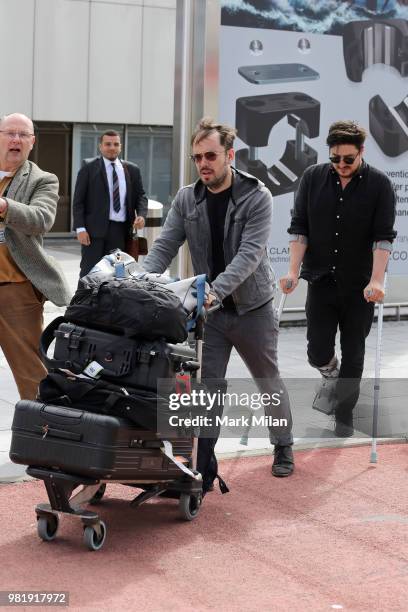 Marcus Mumford and Ben Lovett arriving at Aberdeen Airport before the wedding of Kit Harrington and Rose Leslie on June 23, 2018 in Aberdeen,...