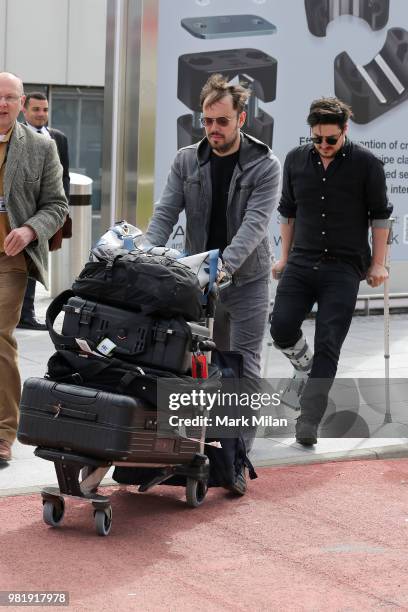 Marcus Mumford and Ben Lovett arriving at Aberdeen Airport before the wedding of Kit Harrington and Rose Leslie on June 23, 2018 in Aberdeen,...