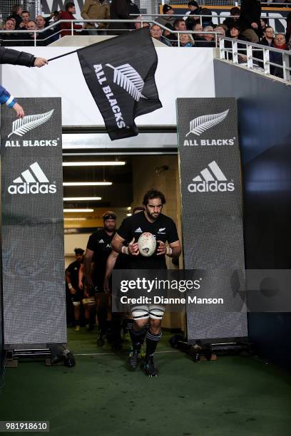 Samuel Whitelock of the All Blacks leads the team on to the field during the International Test match between the New Zealand All Blacks and France...