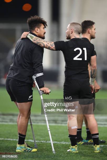 Ardie Savea is consoled by TJ Perenara following the International Test match between the New Zealand All Blacks and France at Forsyth Barr Stadium...