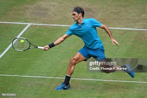 Roger Federer of Switzerland plays a forehand in his half final match against Denis Kudla of the United States during day six of the Gerry Weber Open...