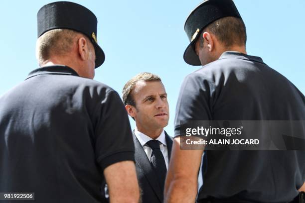French President Emmanuel Macron meets with soldiers as he visits the Institution nationale des Invalides , a French army medical institution...