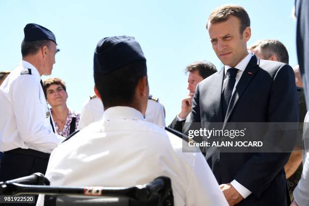 French President Emmanuel Macron meets with patients as he visits the Institution nationale des Invalides , a French army medical institution...