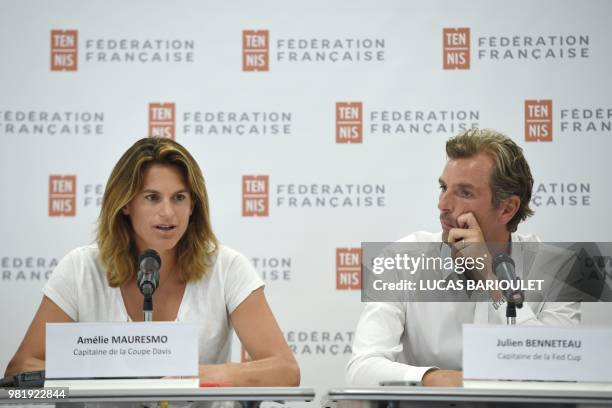 French former world number one Amelie Mauresmo speaks during a press conference after she became the first woman appointed to captain France's Davis...