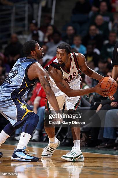 John Salmons of the Milwaukee Bucks handles the ball against O.J. Mayo of the Memphis Grizzlies during the game on March 28, 2010 at the Bradley...