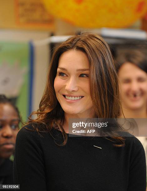 French First Lady Carla Bruni Sarkozy visits at a KIPP school , a school for underprivileged pupils on March 30, 2010 in Washington, DC. AFP...