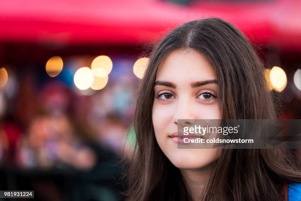 close up of independent young adult woman outdoors with bokeh background - beautiful romanian women stock pictures, royalty-free photos & images