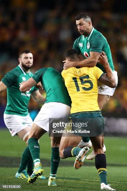 Israel Folau of the Wallabies and Rob Kearney of Ireland compete for the ball from a kick during the Third International Test match between the...