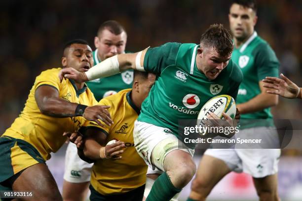 Peter O'Mahony of Ireland is tackled during the Third International Test match between the Australian Wallabies and Ireland at Allianz Stadium on...