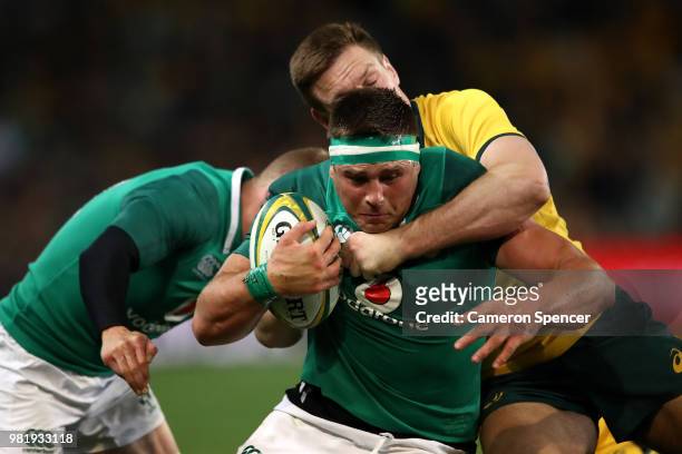 Stander of Ireland is tackled during the Third International Test match between the Australian Wallabies and Ireland at Allianz Stadium on June 23,...