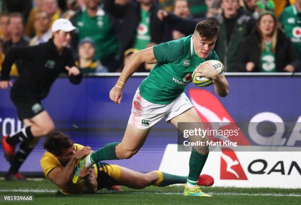 Jacob Stockdale of Ireland is tackled by Nick Phipps of the Wallabies during the Third International Test match between the Australian Wallabies and...