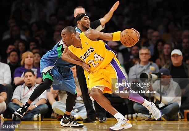 Kobe Bryant of the Los Angeles Lakers makes a move against Corey Brewer of the Minnesota Timberwolves during the game at Staples Center on March 19,...