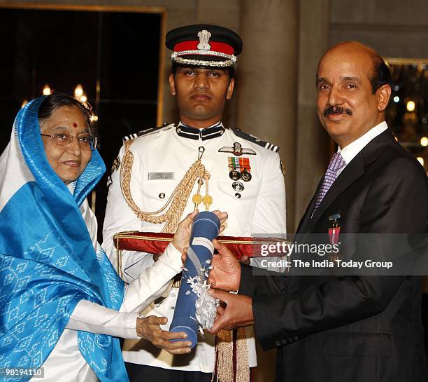 President Pratibha Patil presents the Padma Bhushan to Dr. Ramkrishna Madan Mohan Panda at the Rashtrapati Bhavan in New Delhi on Wednesday, March...