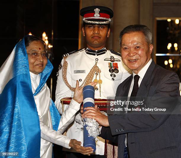 President Pratibha Patil presents the Padma Bhushan award to Prof. Tan Chung at the Rashtrapati Bhavan in New Delhi on Wednesday, March 31, 2010.