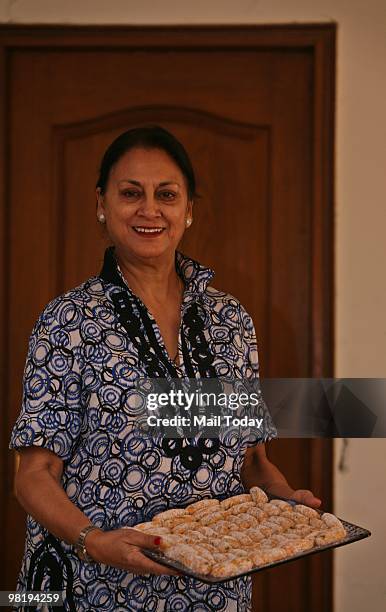 Kuku Duggal, who has started her own boutique catering services in the capital, poses in New Delhi on March 28, 2010.