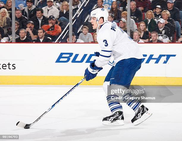 Dion Phaneuf of the Toronto Maple Leafs controls the puck against the Pittsburgh Penguins on March 28, 2010 at Mellon Arena in Pittsburgh,...