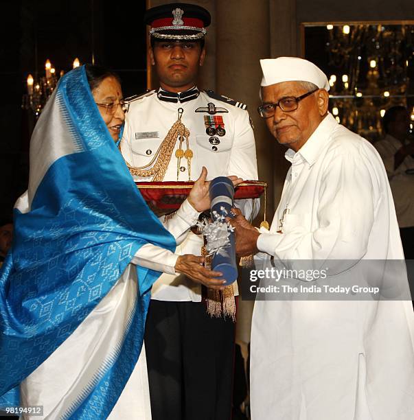 President Pratibha Patil presents the Padma Bhushan to Ekanthrao Vithalrao at the Rashtrapati Bhavan in New Delhi on Wednesday, March 31, 2010.