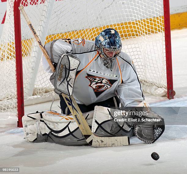 Goaltender Dan Ellis of the Nashville Predators defends the net against the Florida Panthers at the BankAtlantic Center on March 29, 2010 in Sunrise,...