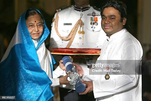 President Pratibha Patil presenting Padma Bhushan Award to music composer A R Rahman at the 2010 Padma awards distributing ceremony at the...