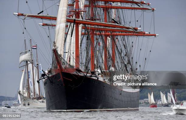 June 2018, Germany, Kiel: The Russian four-master 'Sedov' is on the Fjord during the windjammer parade at the Kieler Woche . There are considerably...