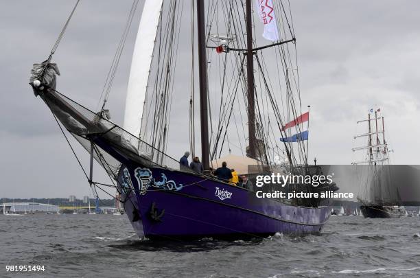 June 2018, Germany, Kiel: Traditional sailing ships during the windjammer parade at the Kieler Woche . There are considerably less tall ships who...