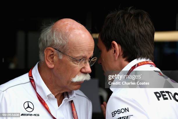 Mercedes GP Executive Director Toto Wolff talks with Head of Mercedes Cars Dieter Zetsche in the garage during final practice for the Formula One...