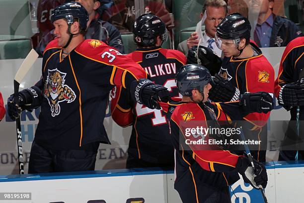 Stephen Weiss of the Florida Panthers is congratulated by teammates after scoring a goal against the Nashville Predators at the BankAtlantic Center...