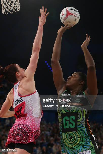 Jhaniele Fowler of the Fever shoots the ball during the round eight Super Netball match between the Fever and the Thunderbirds at Perth Arena on June...