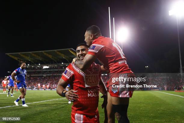 Robert Jennings of Tonga celebrates with team mates after scoring a try during the 2018 Pacific Test Invitational match between Tonga and Samoa at...