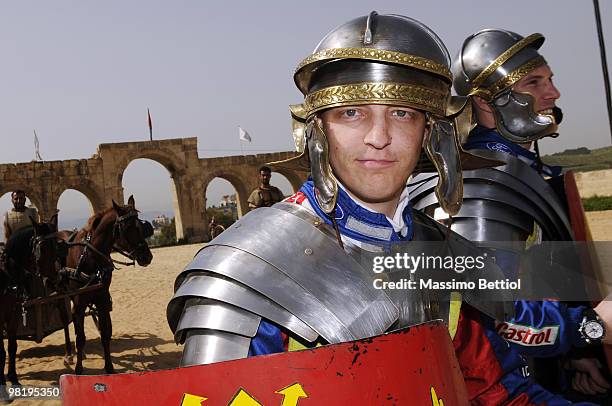 Mikko Hirvonen of Finland poses for photographs dressed as a Roman gladiator before the official start of the WRC Rally Jordan from the millenary...