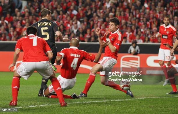 Daniel Agger of Liverpool scores the first goal during the UEFA Europa League, quarter-final first leg match between Benfica and Liverpool at Estadio...