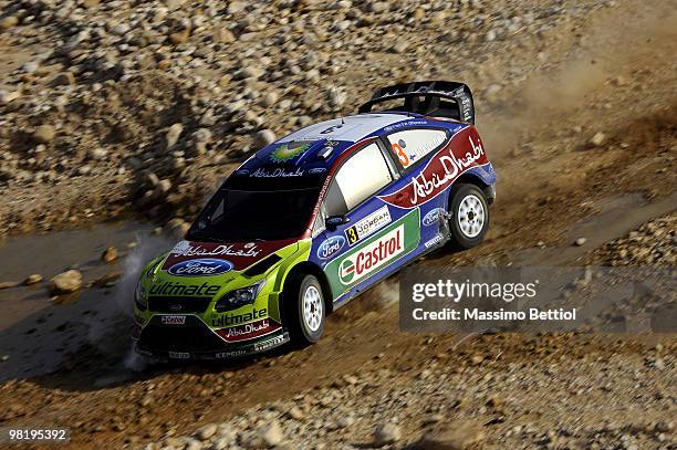 Mikko Hirvonen of Finland and Jarmo Lehtinen of Finland compete in their BP Abu Dhabi Ford Focus during Leg 1 of the WRC Rally Jordan on April 1,...