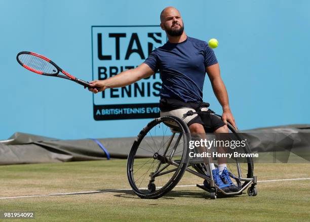 Stefan Olsson of Sweden plays a forehand during the men's wheelchair match against Alfie Hewett of Great Britain during Day 6 of the Fever-Tree...