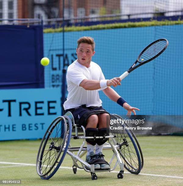 Alfie Hewett of Great Britain plays a backhand during the men's wheelchair match against Stefan Olsson of Sweden during Day 6 of the Fever-Tree...