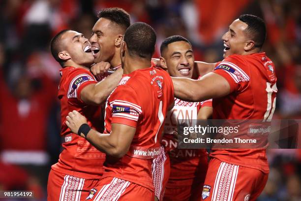 Junior Tatola of Tonga celebrates with team mates after scoring a try during the 2018 Pacific Test Invitational match between Tonga and Samoa at...