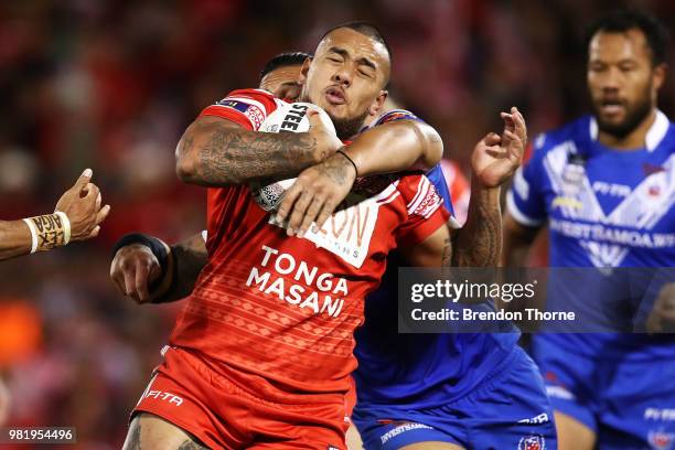 Addin Fonua-Blake of Tonga is tackled by the Samoan defence during the 2018 Pacific Test Invitational match between Tonga and Samoa at Campbelltown...