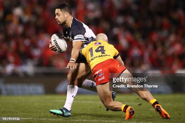 Jarryd Hayne of Fiji is tackled by Kurt Baptiste of PNG during the 2018 Pacific Test Invitational match between Fiji and Papua New Guinea at...