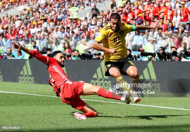 Dylan Bronn of Tunisia tackles Eden Hazard of Belgium during the 2018 FIFA World Cup Russia group G match between Belgium and Tunisia at Spartak...