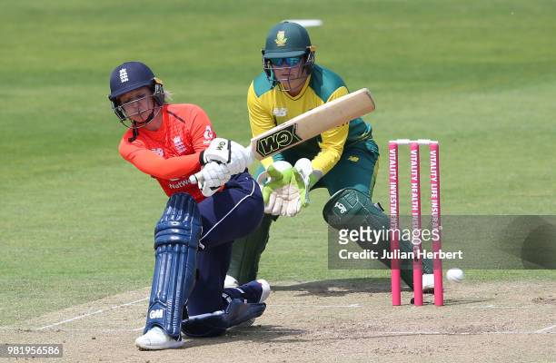Lizelle Lee of South Africa looks on as Sarah Taylor of England scores runs during the International T20 Tri-Series match between England Women and...