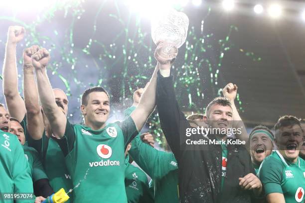 Johnny Sexton and Peter O'Mahony of Ireland hold the trophy up as Ireland celebrate victory after winning the series and the Third International Test...