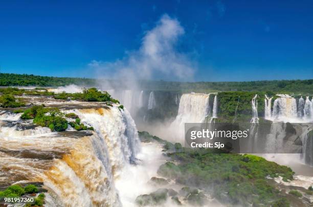 iguazu falls on the border of argentinia and brazil in south america - southern brazil stock pictures, royalty-free photos & images
