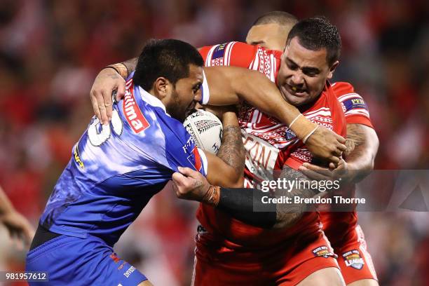 Ligi Sao of Samoais tackled by Andrew Fifita of Tonga during the 2018 Pacific Test Invitational match between Tonga and Samoa at Campbelltown Sports...