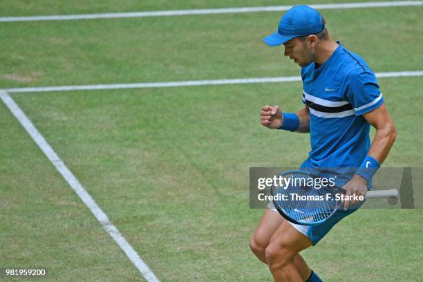 Borna Coric of Croatia celebrates in his half final match against Roberto Bautista Agut of Spain during day six of the Gerry Weber Open at Gerry...